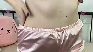 Candid camera gets spicy image of naughty girl undressing