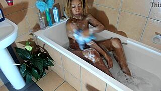 Sexy ebony babe takes a bath