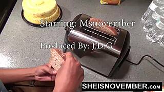 black reality pornstar sheisnovember kneels for closeup blowjob on bigbrother's huge cock after intense kitchen fucking by msnovember