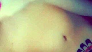 A small busted cute girl gets down with a dildo