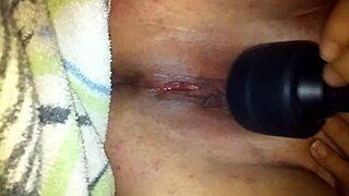 She cums hard with the vibrator, her wet cunt squirting like crazy!