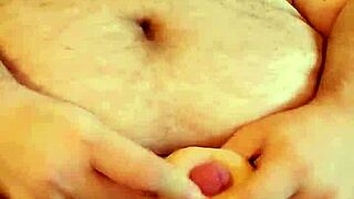 A huge and chubby man watched naked and had a fun with only his hands