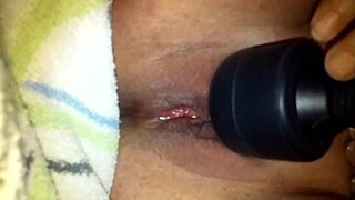 She cums hard with the vibrator, her wet cunt squirting like crazy!