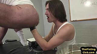 i got fisted by a long haired stud on the office desk, feeling every inch of his gloved hand deep in my ass