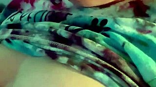 Dirty talking wife smoking cigarette in kinky bedroom scene