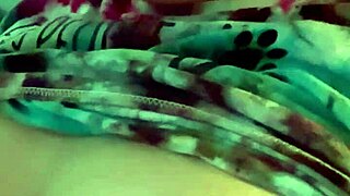Dirty talking wife smoking cigarette in kinky bedroom scene