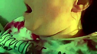 Dirty talking wife smoking cigarette in kinky bedroom scene