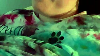 Dirty talking wife smoking cigarette in kinky bedroom scene