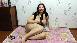 Chubby milf uses bottle for solo play at home