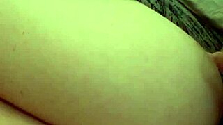 Jerking cock on wife's natural tits