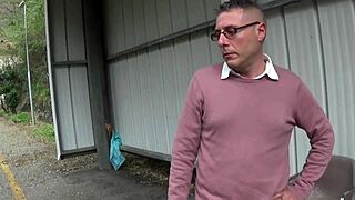 Mature woman in glasses relaxes outdoors