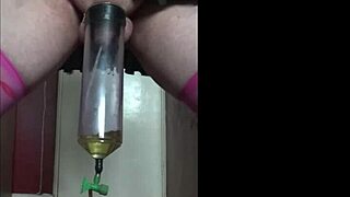 Crossdressing gay Mark Wright pissing and swallowing cock