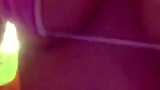 Girl performing stripper dance at house