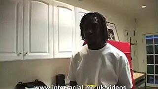 A black man explores interracial sex with his partner in an intimate encounter.