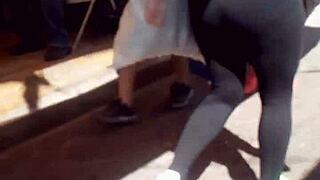 Milf shows off her rich ass on the street