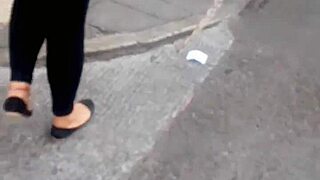 Milf shows off her rich ass on the street