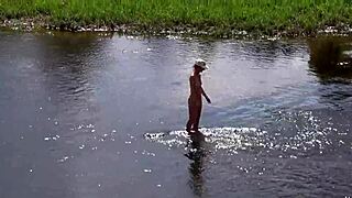 Russian Mature Woman Enjoys Nude Bathing Outdoors