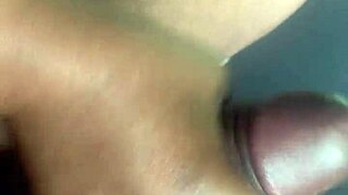African two part time lovers fondling a car in car sex, she gives him a handjob