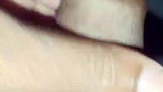 In a homemade setting, amateurs explore personal boundaries through intimate hand gestures.