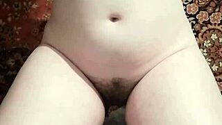 pretty woman with clothespins gripping her sensitive nipples in tight bondage