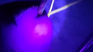 Slave endures painful nettle insertion on cock.