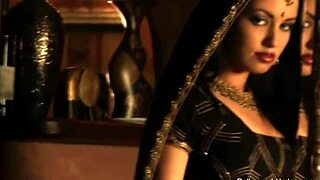 Intense erotic dancing in the indian night, seducing her lover passionately.
