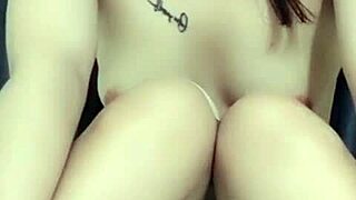 girl from hue plays with her rabbit toy in a fun way