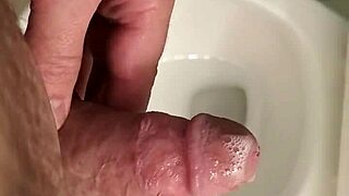 He strokes his big saliva covered cock