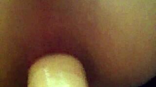 A woman uses a strapon to fuck her partner's ass in an intense anal session, focusing on deep assfucking and fucking.