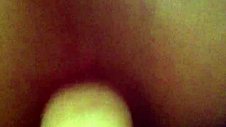 A woman uses a strapon to fuck her partner's ass in an intense anal session, focusing on deep assfucking and fucking.