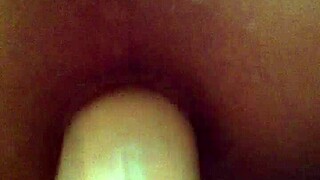 A woman uses a strapon to fuck her partner's ass in an intense anal session, focusing on deep assfucking and fucking.