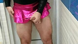 Transsexual in sexy leotard and shiny skirt