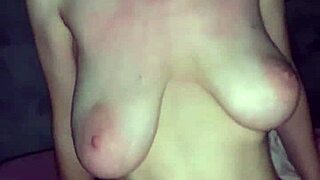 A girl is screwing with her pussy as her fella licks tits while she receives a big cock