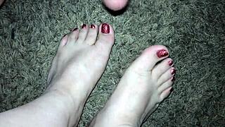 Red toenails Latina slut gets a cumshot!!! Footjob fetishists rejoice!!!