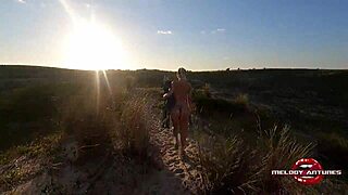 Melody Antunes caresses herself on the beach