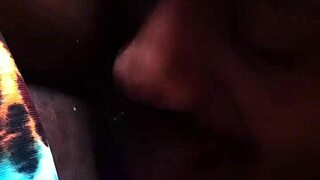 a couple shares an intimate moment in the image