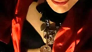 Regina Babylon, the shemale milf, teases in her boots on the street.