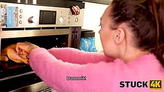 Girlfriend's hand stuck in oven, feeling desperate for doggystyle creampie.