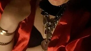 Regina Babylon, the shemale milf, teases in her boots on the street.