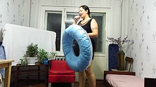 Milf inflates balloons with blow on beach circle fetish