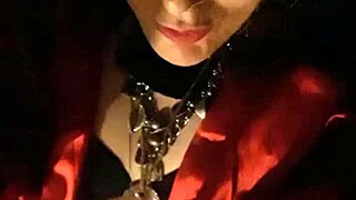 Regina Babylon, the shemale milf, teases in her boots on the street.