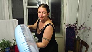 Milf inflates balloons with blow on beach circle fetish