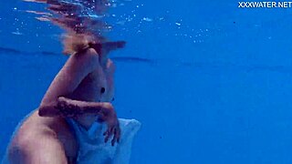 finnish blonde tattooed pornstar mimi dives underwater