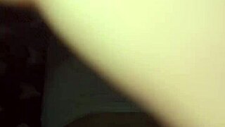 the blonde woman and her partner in an amateur video with everyday moments and casual interactions