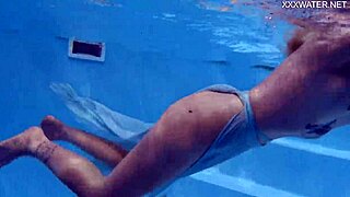 finnish blonde tattooed pornstar mimi dives underwater