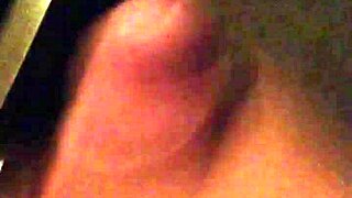 Horny gay guy strokes his cock and shoots cum