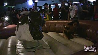 Hot girls in lingerie compete in wild bull riding at Florida bar
