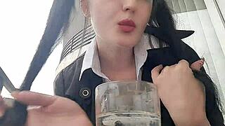 Dominatrix Nika SMOKES seductively and SPITS into a glass, treating you as her ashtray.