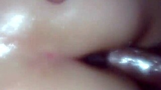 Oiled pussy gets pounded by hard cock in intense session.