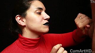 in that cfnm scene, red turtleneck and black lips girl gives handjob, mouthful of cum on clothes.